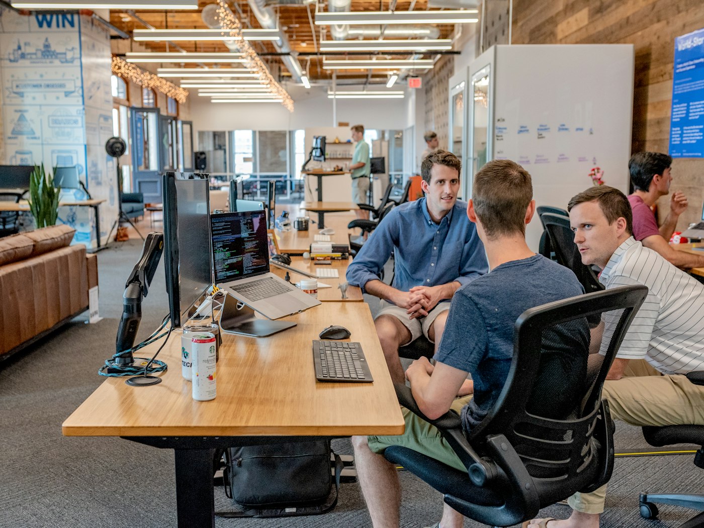 A product team collaborating in a modern open office